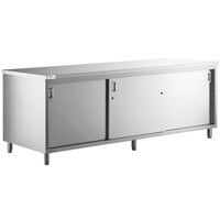 Regency 30" x 96" 16 Gauge Type 304 Stainless Steel Enclosed Base Table with Sliding Doors and Adjustable Midshelf