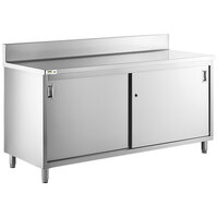 Regency 24" x 72" 16 Gauge Type 304 Stainless Steel Enclosed Base Sliding Door Table with Adjustable Midshelf and 6" Backsplash