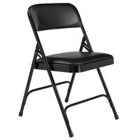 National Public Seating 1210 Black Metal Folding Chair with 1 1/4" Caviar Black Vinyl Padded Seat - 4/Pack