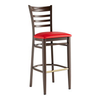 Lancaster Table & Seating Spartan Metal Ladder Back Bar Stool with Dark Walnut Wood Grain Finish and Red Vinyl Seat - Assembled
