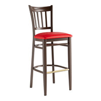 Lancaster Table & Seating Spartan Series Metal Slat Back Bar Stool with Dark Walnut Wood Grain Finish and Red Vinyl Seat - Assembled