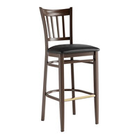 Lancaster Table & Seating Spartan Series Metal Slat Back Bar Stool with Dark Walnut Wood Grain Finish and Black Vinyl Seat