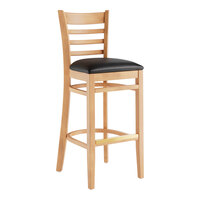 Lancaster Table & Seating Natural Finish Wood Ladder Back Bar Stool with Black Vinyl Seat - Assembled