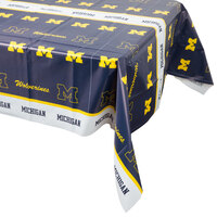 Creative Converting 331399 54" x 108" University of Michigan Plastic Table Cover - 12/Case