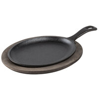 Lodge 10" x 7 1/2" Oval Pre-Seasoned Cast Iron Fajita Skillet with Handle and Walnut Finish Wood Underliner