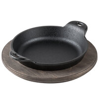 Lodge 14 oz. Pre-Seasoned Heat-Treated Mini Cast Iron Round Casserole Dish with Walnut Wood Underliner