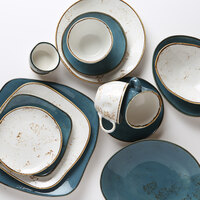 Tuxton GGE-651 TuxTrendz Artisan Geode Azure 10" x 8 1/4" China Ellipse Plate - 12/Case