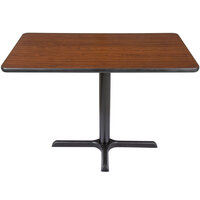 Lancaster Table & Seating 24" x 42" Reversible Walnut / Oak Table Standard Height Table and Base Kit with 22" x 30" Cast Iron Base