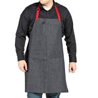 Uncommon Chef 3121 Confetti Denim Customizable Poly-Cotton Deviate Bib Apron with Red Webbing and 7 Pockets - 34" x 31"