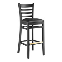 Lancaster Table & Seating Black Finish Wood Ladder Back Bar Stool with Black Vinyl Seat - Assembled