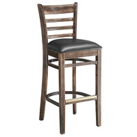 Lancaster Table & Seating Vintage Finish Wood Ladder Back Bar Stool with Black Vinyl Seat