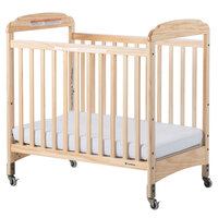 Foundations 2532040 Serenity 24" x 38" Natural Compact Fixed-Side Clearview Wood Crib with Adjustable Mattress Board and 3" InfaPure Mattress