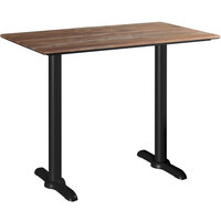 Lancaster Table & Seating Excalibur 28" x 48" Rectangular Counter Height Table with Textured Yukon Oak Finish and Two End Outdoor Base Plates