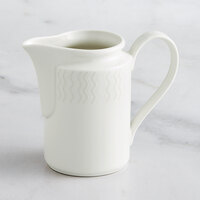 RAK Porcelain Leon 11.9 oz. Ivory Embossed Porcelain Creamer - 6/Case