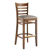 Lancaster Table & Seating Vintage Finish Wood Ladder Back Bar Stool with Dark Gray Vinyl Seat - Assembled