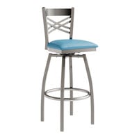 Lancaster Table & Seating Clear Coat Finish Cross Back Swivel Bar Stool with 2 1/2" Blue Vinyl Padded Seat