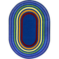 Joy Carpets Kid Essentials Rainbow Rings 5' 4" x 7' 8" Multicolored Oval Area Rug