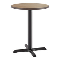 Lancaster Table & Seating 24" Round Reversible Birch / Ash Laminated Standard Height Table and Base Kit with 22" x 22" Cast Iron Base