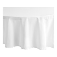 Choice 132" Round White Seamless 100% Spun Polyester Hemmed Cloth Table Cover