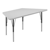 Correll 26" x 58" Trapezoid White 19"-29" Adjustable Height High-Pressure Dry Erase Board Top Activity Table with Black Legs and Gray T-Mold