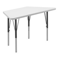 Correll Trapezoid White 19"-29" Adjustable Height High-Pressure Dry Erase Board Top Activity Table with Black Legs and Gray T-Mold