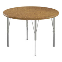 Correll Deluxe Round Medium Oak 19"-29" Adjustable Height High-Pressure Laminate Top Activity Table with Silver Legs and Medium Oak T-Mold