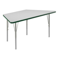 Correll 26" x 58" Trapezoid White 19"-29" Adjustable Height High-Pressure Dry Erase Board Top Activity Table with Silver Legs and Green T-Mold