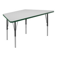 Correll 26" x 58" Trapezoid White 19"-29" Adjustable Height High-Pressure Dry Erase Board Top Activity Table with Black Legs and Green T-Mold
