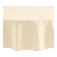 Oxford 132" Round Ivory 100% Spun Polyester Hemmed Edge Cloth Table Cover - 12/Case