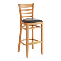 Lancaster Table & Seating Natural Finish Wood Ladder Back Bar Stool with Black Vinyl Seat Cushion - Detached Seat