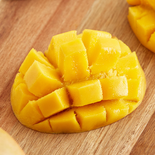 Mango porcupine on a cutting board